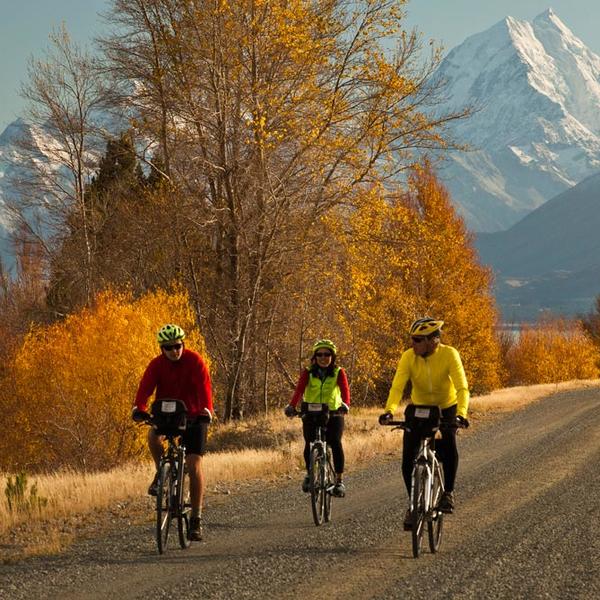 Cycling beneath Mt Cook on the Adventure South Alps to Ocean guided cycle trip.