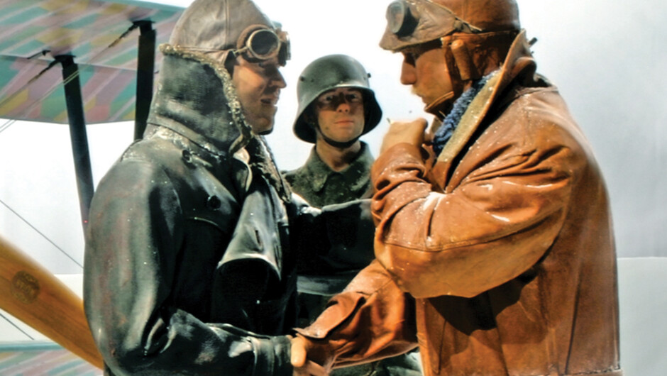 Pilots shaking hands look so realistic you think they are alive.