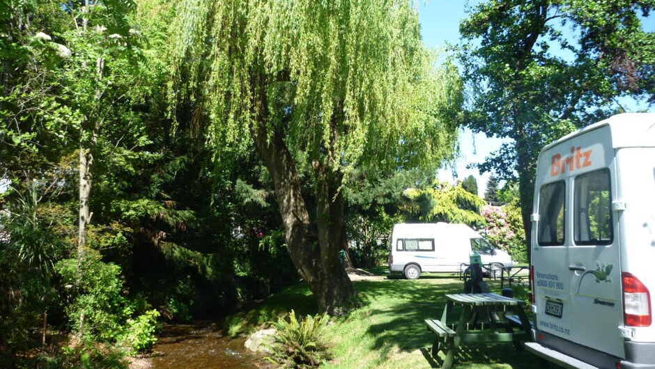 Sites along side Horne Creek at Queenstown Holiday Park & Motels Creeksyde