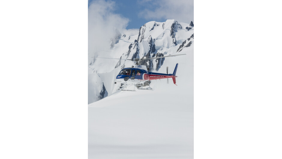 Discover the gigantic expanse of the glacier snowfields with a landing