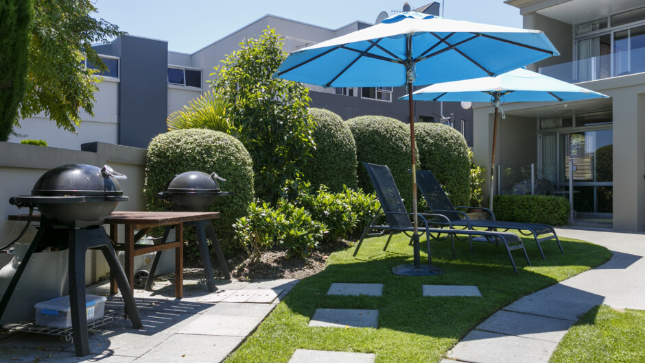 Guest BBQ area and sun loungers