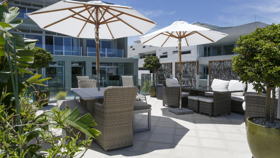 Guest patio with outdoor furniture.