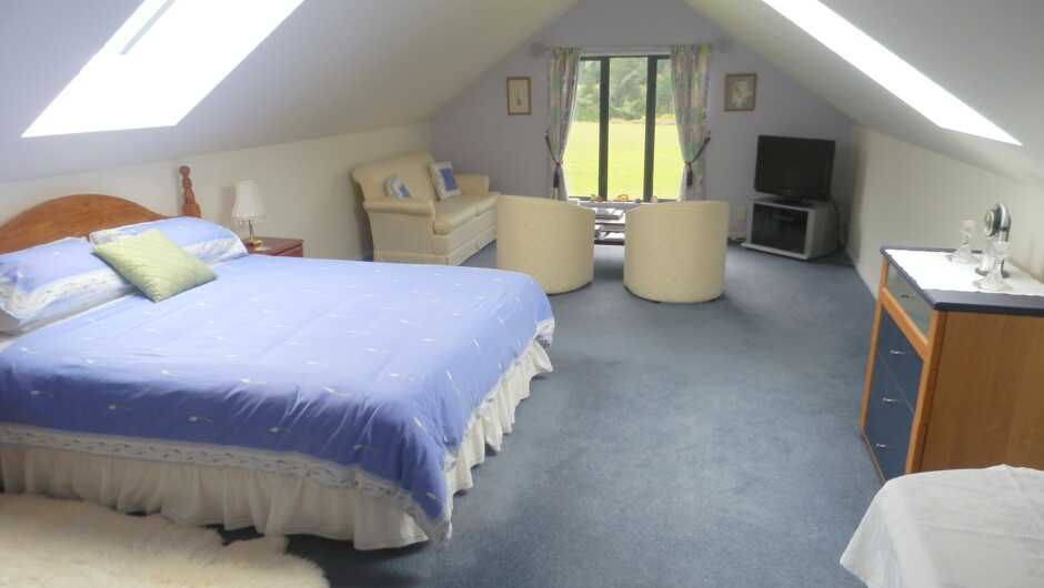 King sized room with en-suite and views of mountain and forest