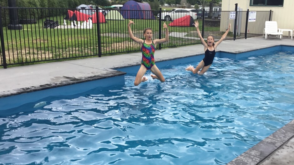 Kids having fun in the pool.