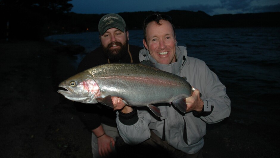 An 11 and a half pound rainbow trout with a very happy angler.