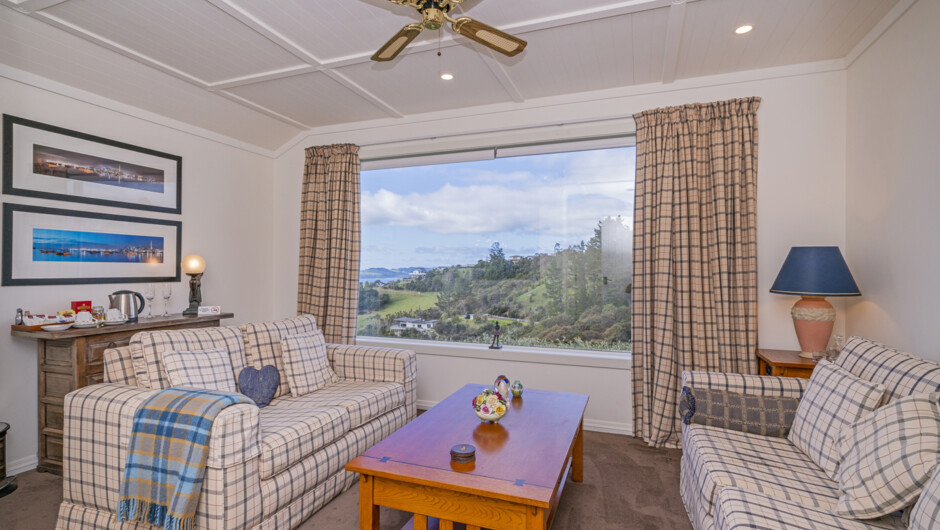 The Tui Suite Living Room with Valley and the Pacific Ocean views