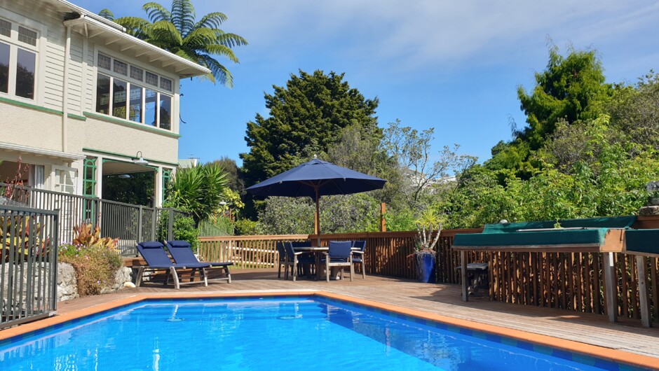 A view of the main house, swimming pool and sun deck.