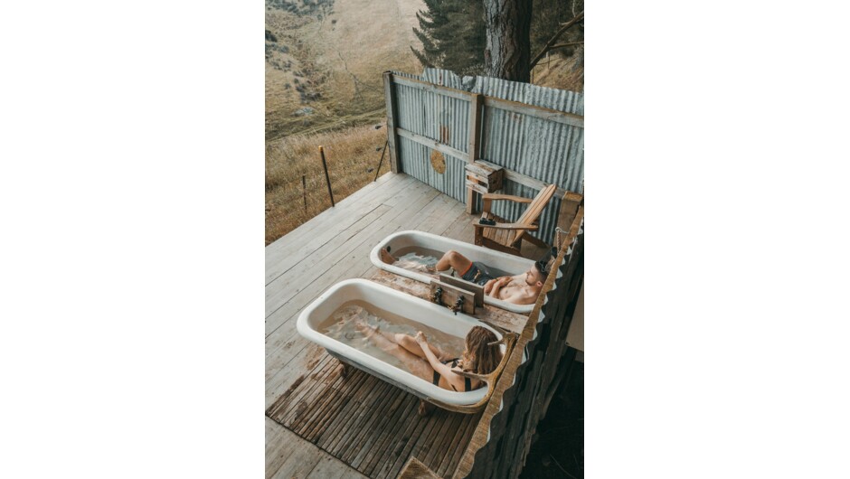 One of 2 set's of outdoor baths located in the forest.