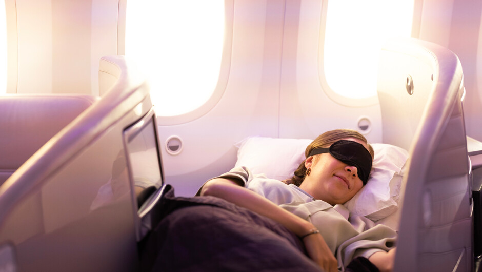 Passenger sleeping in Business Premier