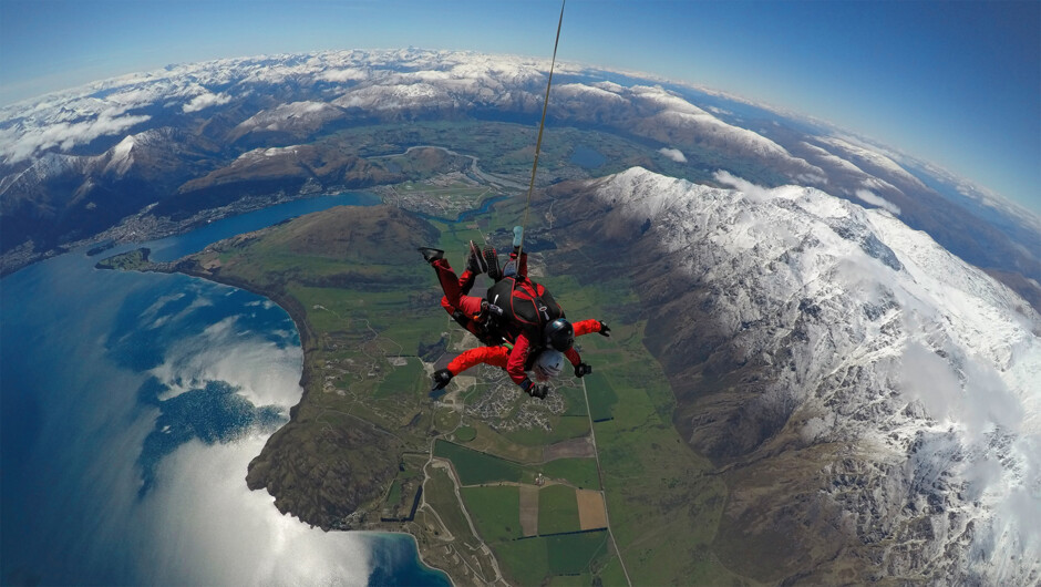 Our drop zone is located at the base of the famous Remarkables mountain range surrounded by a working sheep farm.