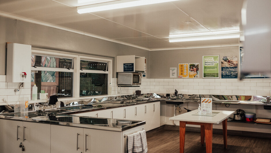 Large communal kitchen with hotplates, microwaves and 2 ovens.