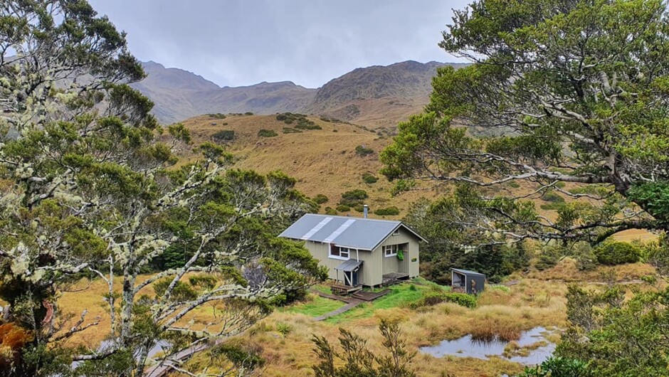 Remote tramping huts on the Dusky Track offer a great refuge from the challenging trail.