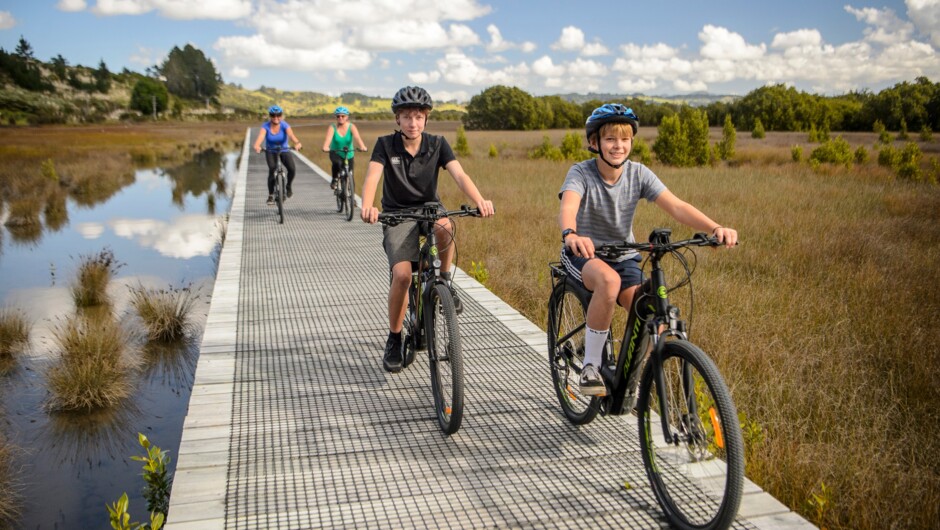 Cycling on the boardwalk heading west to Horeke