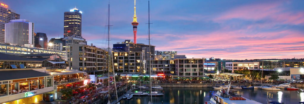 Restaurants and bars line the waterfront, with a backdrop of sheltered waters and sleek super yachts at the Viaduct Harbour.