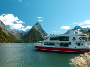 A guided cruise lets you slide between the vertical Mountain views that form the sides of Milford Sound, New Zealands most famous fiord.