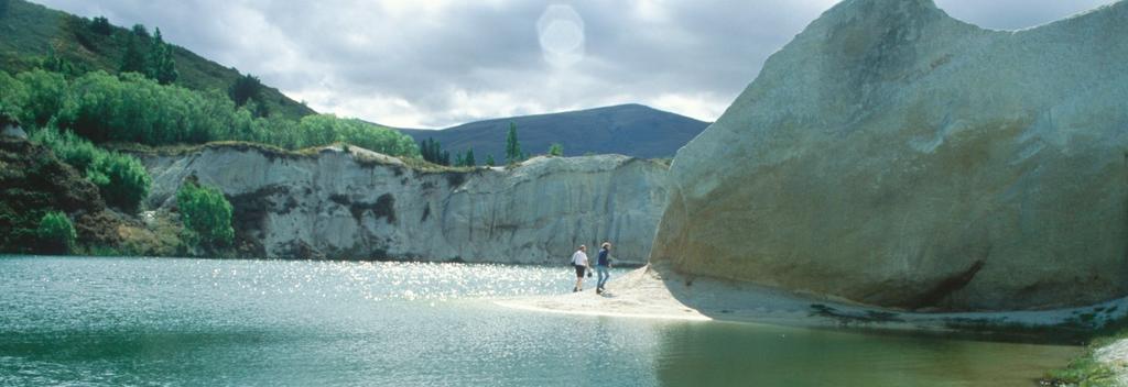 Close to the town, the Blue Lake was created by extensive mining activity.