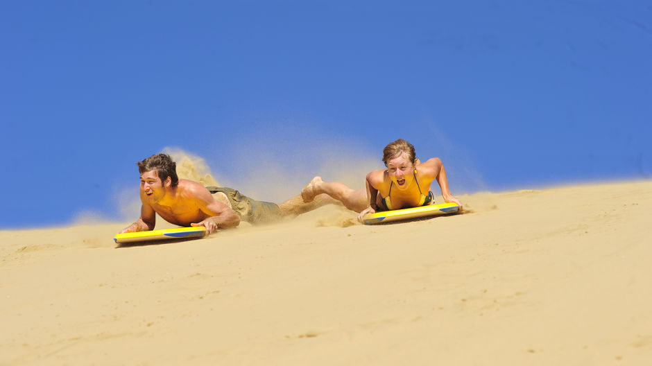 Sandboarding the dunes in Hokianga