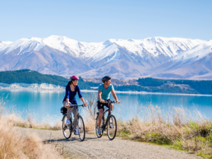 Cycling at Lake Pukaki, near our tallest mountain, Aoraki Mt Cook