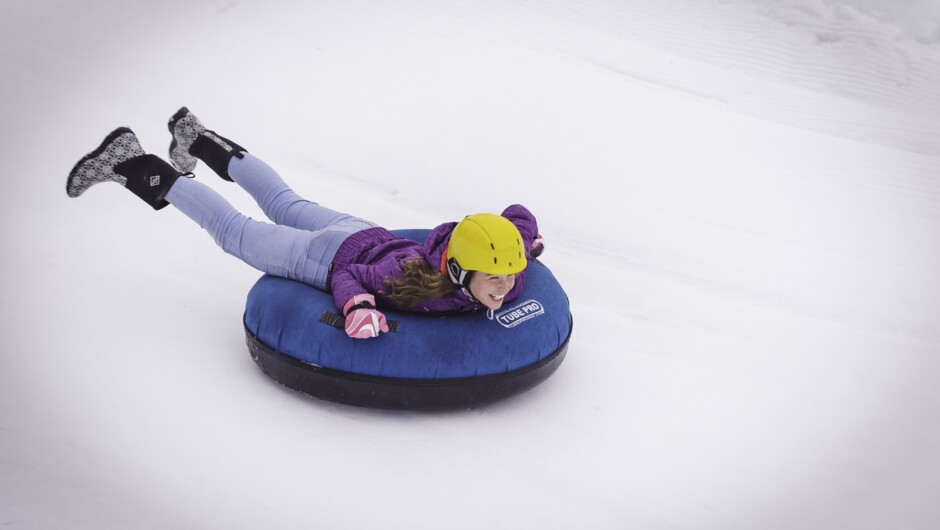 Whizzing down the 150-metre Snow Tube!