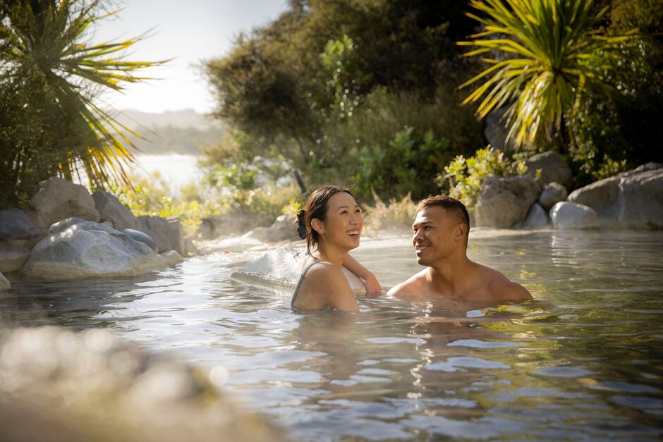 Relaxing in the hot water at Kerosene Creek.