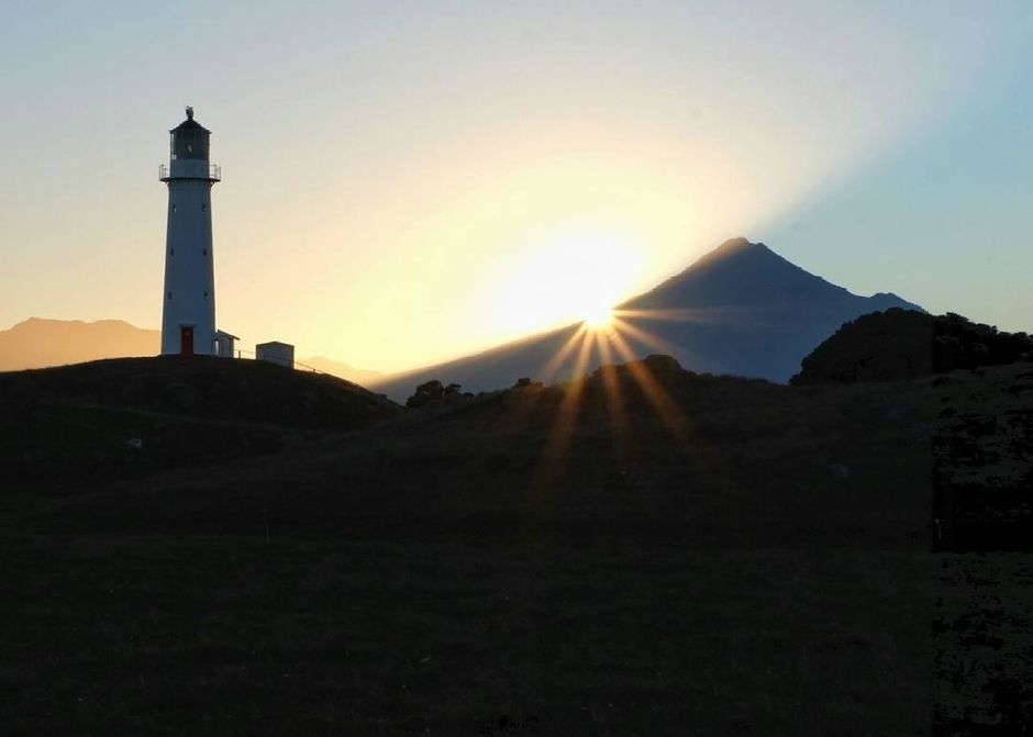 Cape Egmont Lighthouse at sunset.