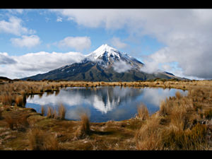 Get perfect views of Mount Taranaki during rewarding hike of the Pouakai Circuit in the northern region of Egmont National Park.