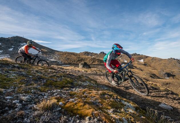 Two chairlifts take riders and bikes up into this summertime, mountain-biking playground, scooting down the slopes of a Southern Alps’ ski resort.