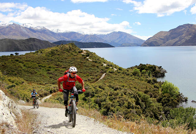 Epic views of Lake Wanaka and the surrounding mountains are ever-present on these mainly easy mountain biking trails heading east and west from central Wanaka.