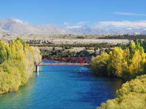 The Red Bridge was built in 1914 and crosses the Clutha River at Luggate.