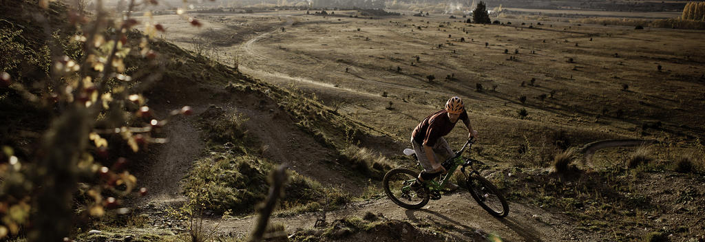 Boasting epic views of  the mighty Clutha/Mata-Au River and Wanaka Basin, Deans Bank is the most popular ride for mountain bikers in Wanaka.