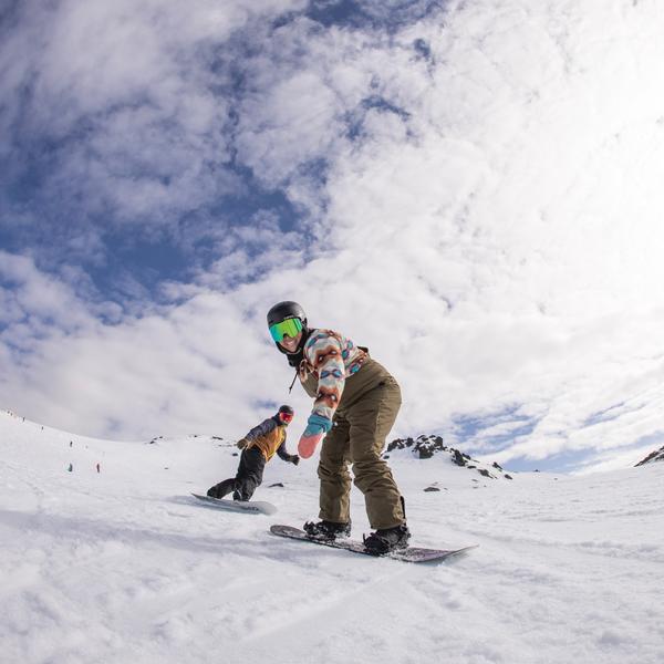 People snowboarding in Cardrona, New Zealand