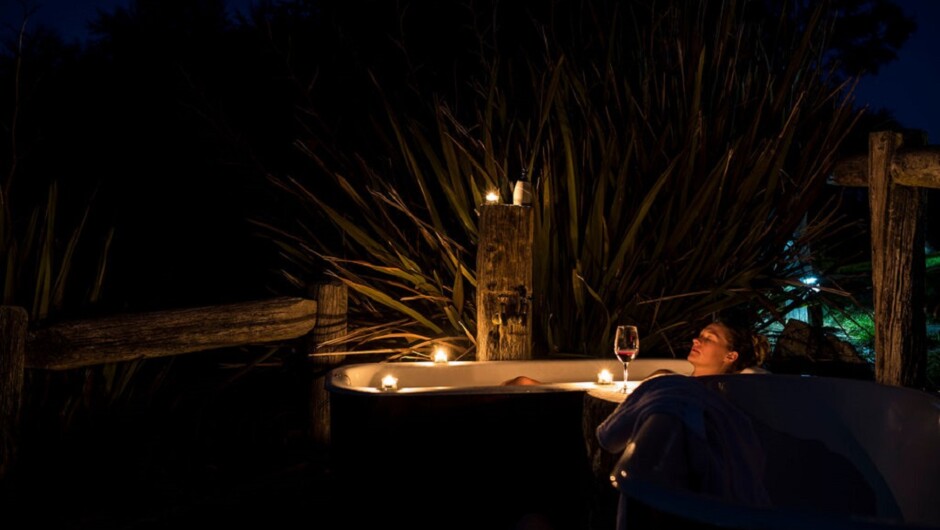 Sink into true bliss and watch the stars above - in the steaming hot outdoor baths that look over the stunning native bush valley below