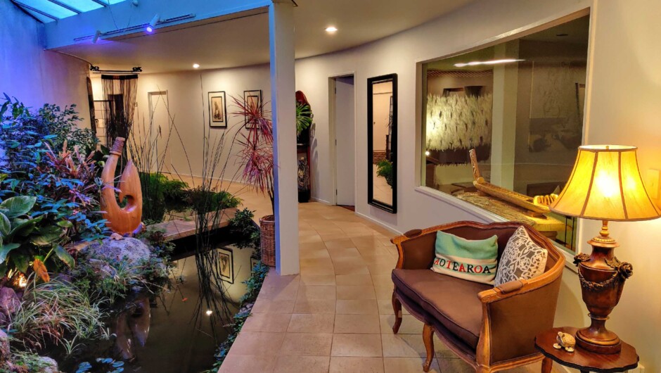 Our unique garden atrium feature indoor trees and plants, complete with babbling brook, goldfish and lily pads.