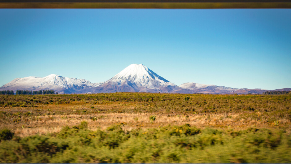 View of Mount Tongariro and volcanic cone of Ngauruhoe from the Northern Explorer's Open-air Viewing Carriage.