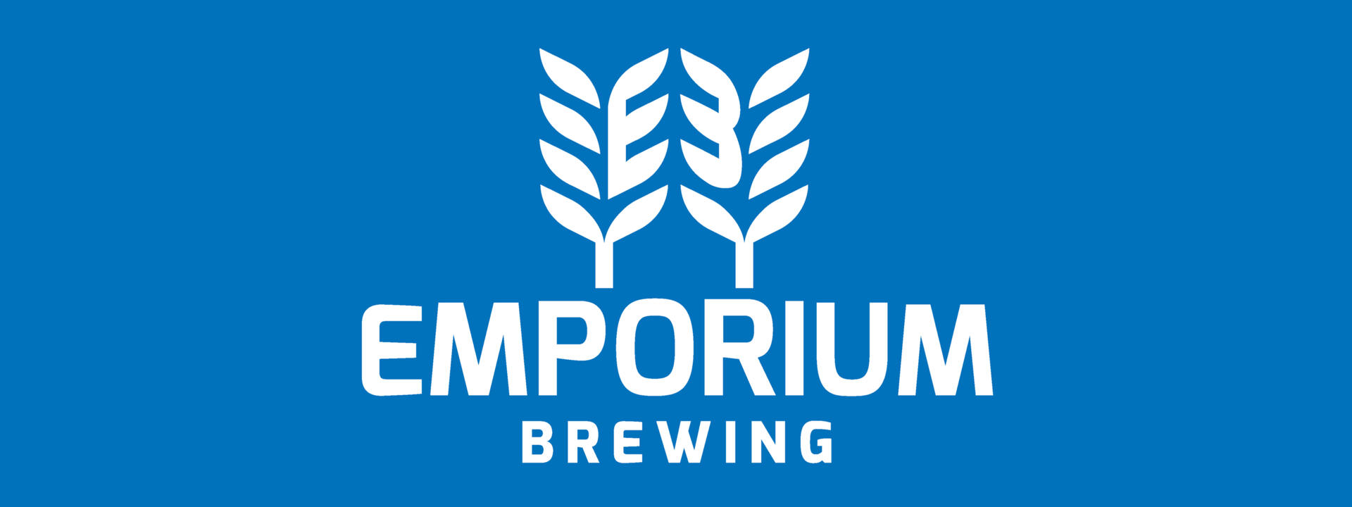 Emporium Logo on blue big background.jpg