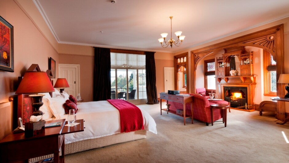 The Rhodes Suite occupies 3 rooms of the original Master Suite, including an octagonal sitting room and offers a balcony overlooking the Great Lawn toward the Southern Alps.