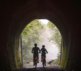 What’s stopping you? Blossoming orchards, lush forests and a gorgeous stretch of New Zealand’s coastline. You just have to get through 1352m of tunnel.