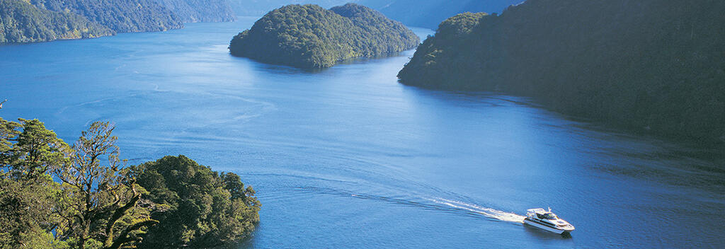 Sail with Real Journeys  through through a magical place filled with thundering waterfalls and epic beauty.  One of 200,000 quests awaiting you. Come play. 