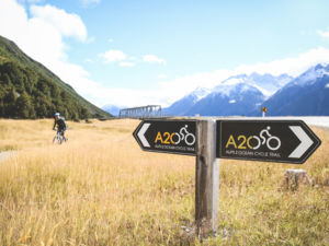 Alps 2 Ocean Section 1 Trail signage and cyclist
