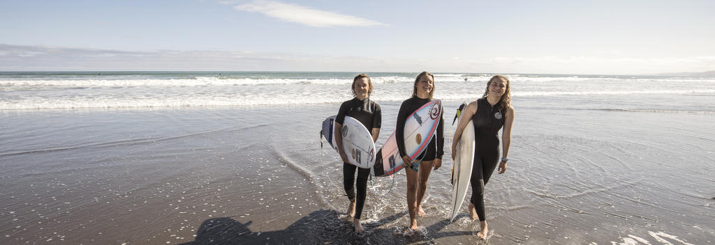 An early morning surf will wake you up when in Raglan