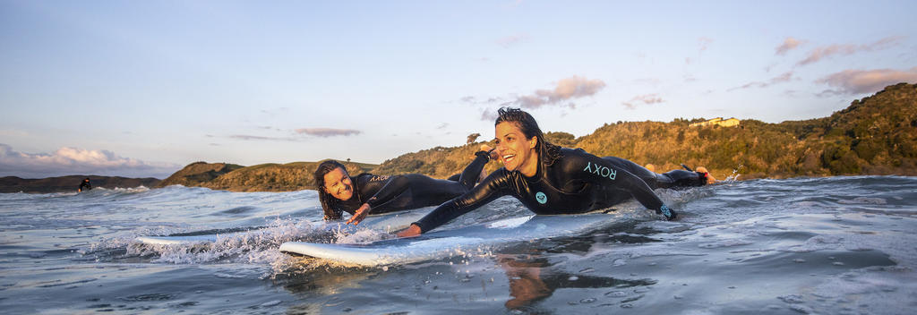 Catching a wave in Raglan