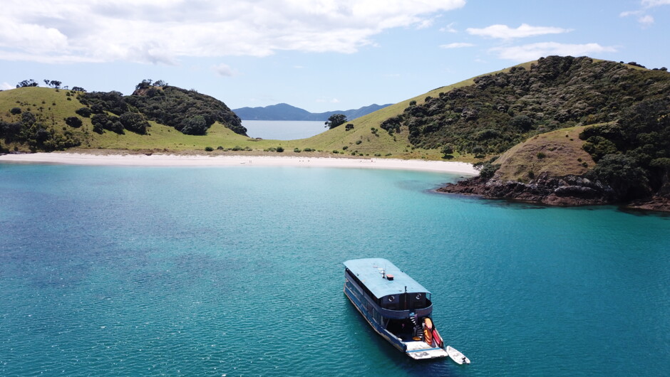 Taking in the stunning views of the Bay of Islands cruising on board The Rock