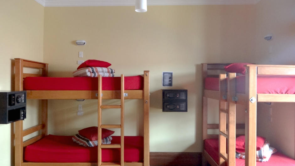 6-8 bed dorm rooms, with personal reading lights, power points and personal safes.