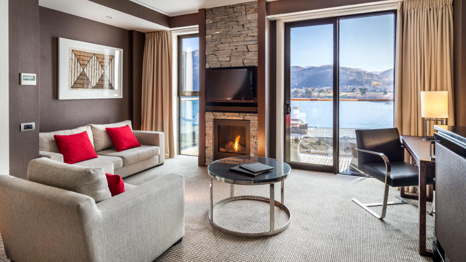 In this Deluxe Lakeview Room, relax on the balcony overlooking Lake Wakatipu, or get cosy on the sofa in front of the gas fire.
