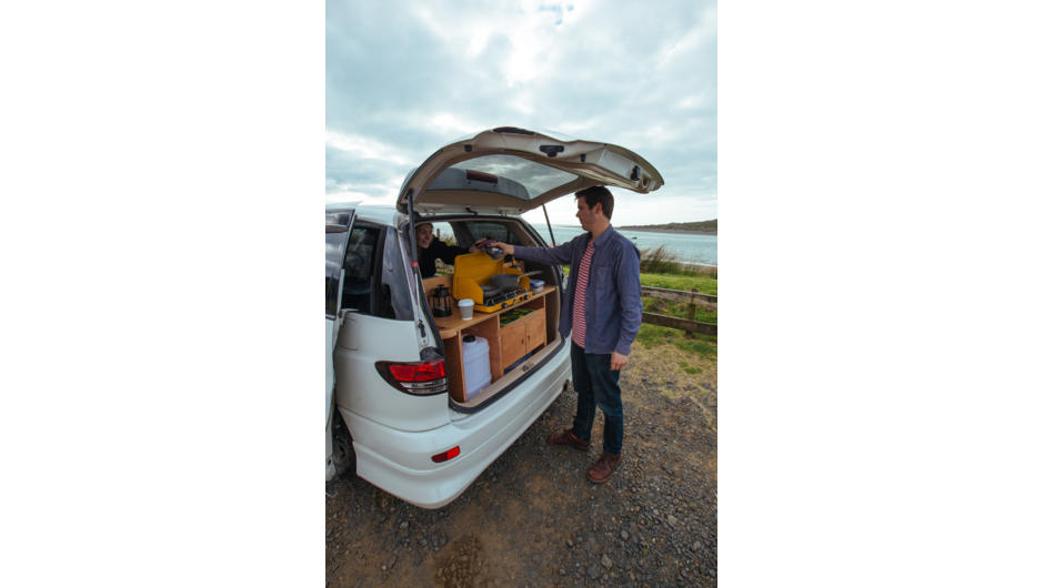 The boot lid doubles as a shelter for cooking in the fully equipped Mode Camper