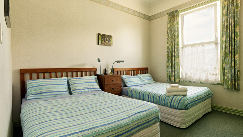 Double glazed Green Room on the ground floor has twin Queen sized beds with a cordless, direct dial phone, Wi-Fi, digital safe, large desk, chair, an LCD flat screen HD colour TV with MP3 playback and a small digital safe for valuables.