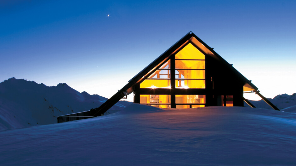 Spend a night at this remote eco-chic chalet, set at 1,750 metres on the edge of Mount Aspiring National Park.
