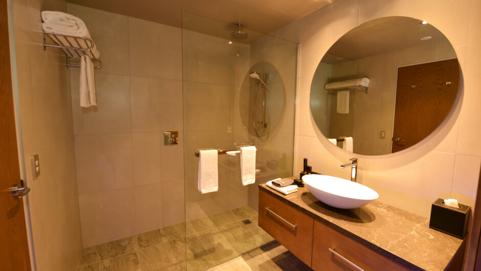 Distinction Dunedin's spacious en-suite bathrooms with double showerheads.