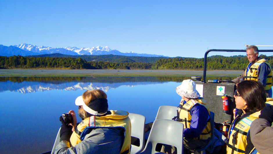 Amazing reflections of the Southern Alps on Okarito Lagoon