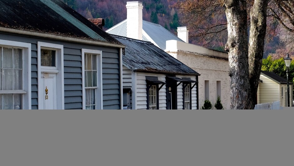 Walk among the tiny restored cottages in Arrowtown.